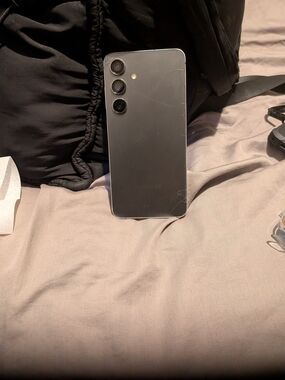 Black Samsung S 24 Triple-Camera Smartphone - Sleek Grey Panel